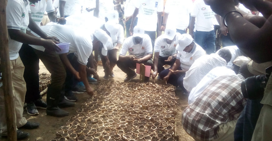 Participants at the Forestry Campaign Edition 2021 - 2022 take part in a nursery bed preperation exercise ahead of the day's celebration activity 
