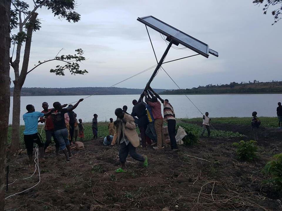 Project implementation time; a solar irrigation system being installed near a water body to facilitate crop irrigation